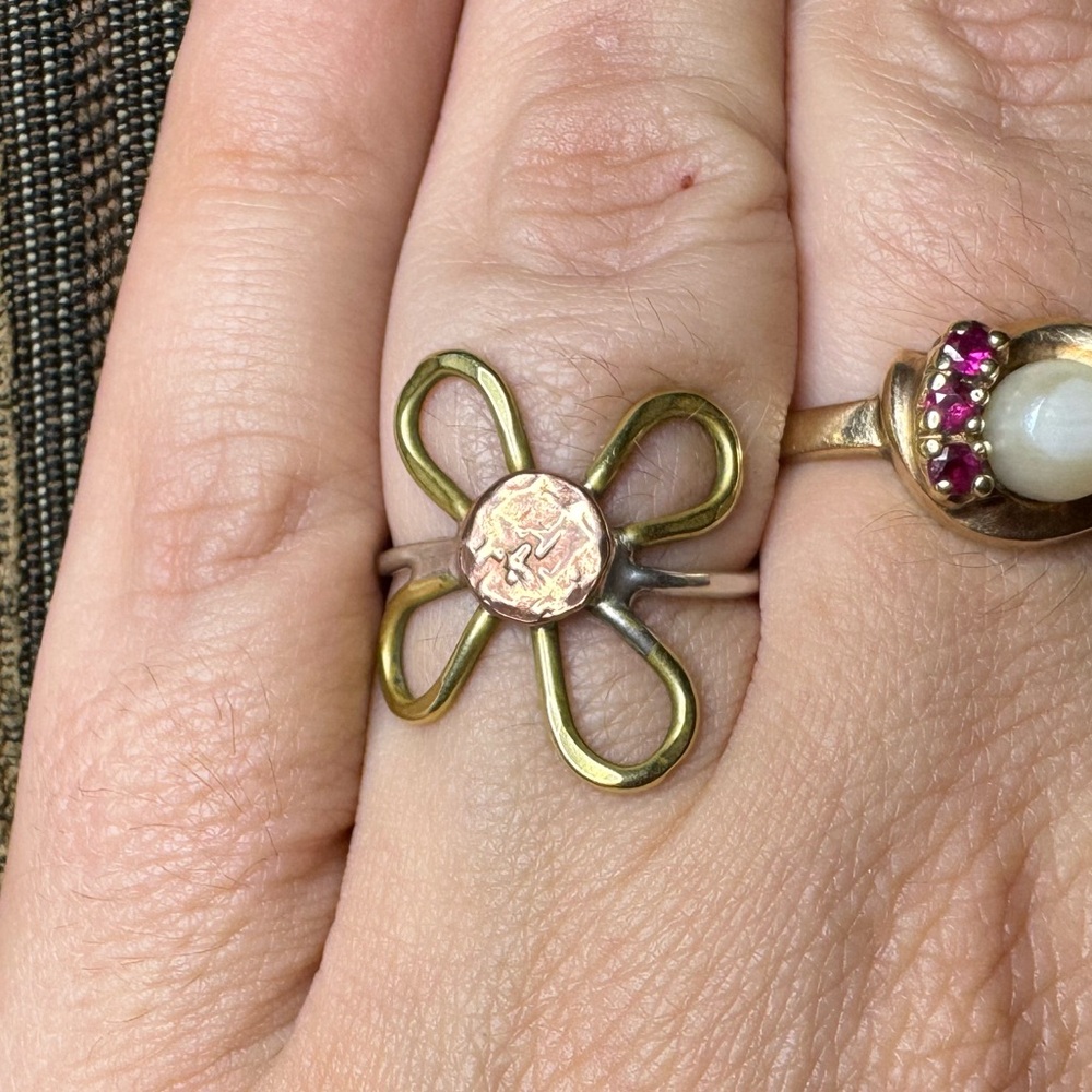 Handcrafted sterling silver, brass and copper daisy ring.